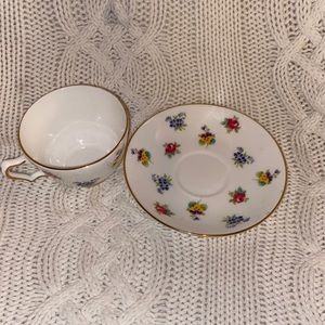 PRE OWNED TEA CUP AND SAUCER